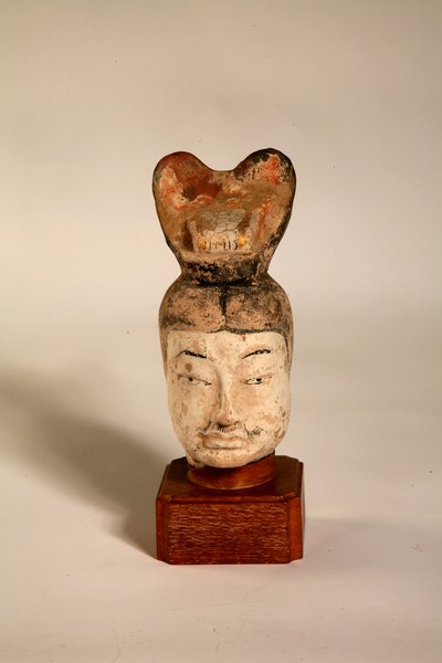 Head of a civilian official on a European wooden stand, from a tomb in Northern China, 618-705 by Tang Dynasty Chinese School